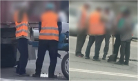 Дорожные рабочие во время ямочного ремонта пили алкоголь, а один мочился в яму - видео
