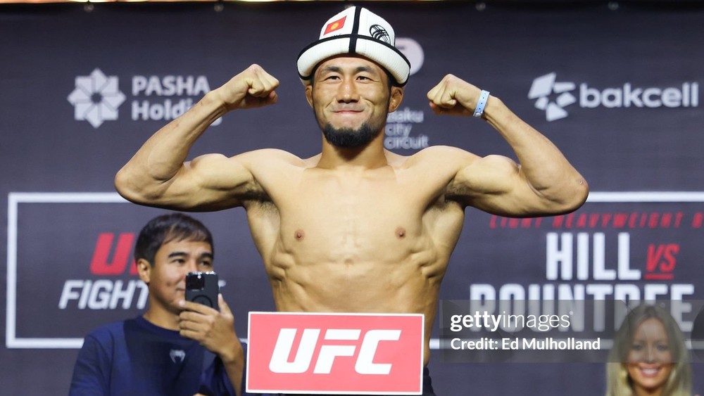 BAKU, AZERBAIJAN - JUNE 20: Myktybek Orolbai of Kyrgyzstan poses on the scale during the UFC Fight Night ceremonial weigh-ins at Baku Crystal Hall on June 20, 2025 in Baku, Azerbaijan. (Photo by Ed Mulholland/Zuffa LLC)