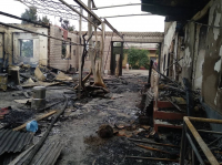 Несколько домов сгорели во время пожара в Ошской области (фото)